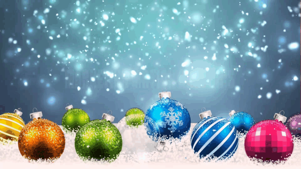 Colourful Christmas baubles on snow